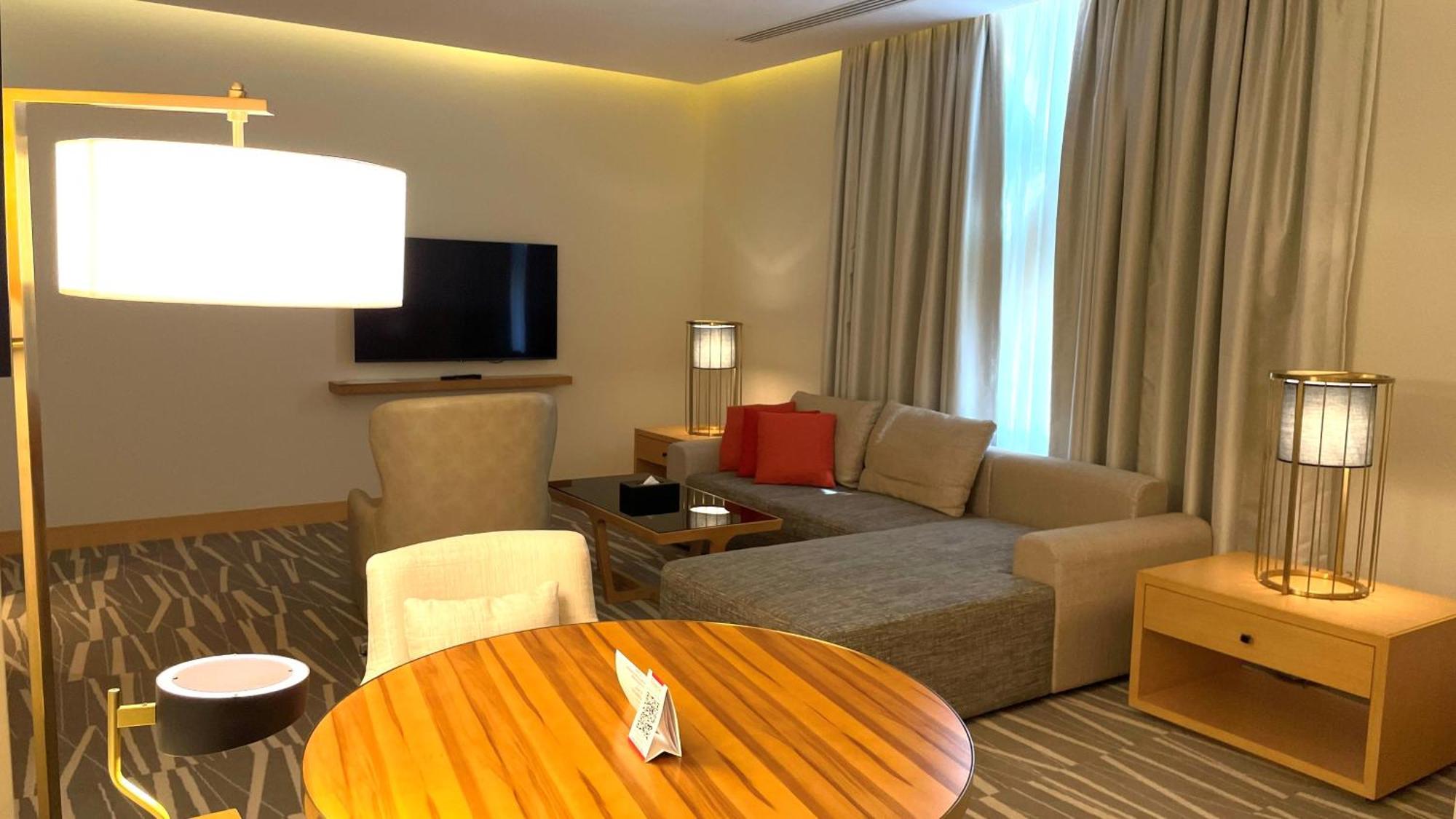 Ramada Hotel & Suites By Wyndham Al Qassim Al Bukayriah Ngoại thất bức ảnh Living room of a suite