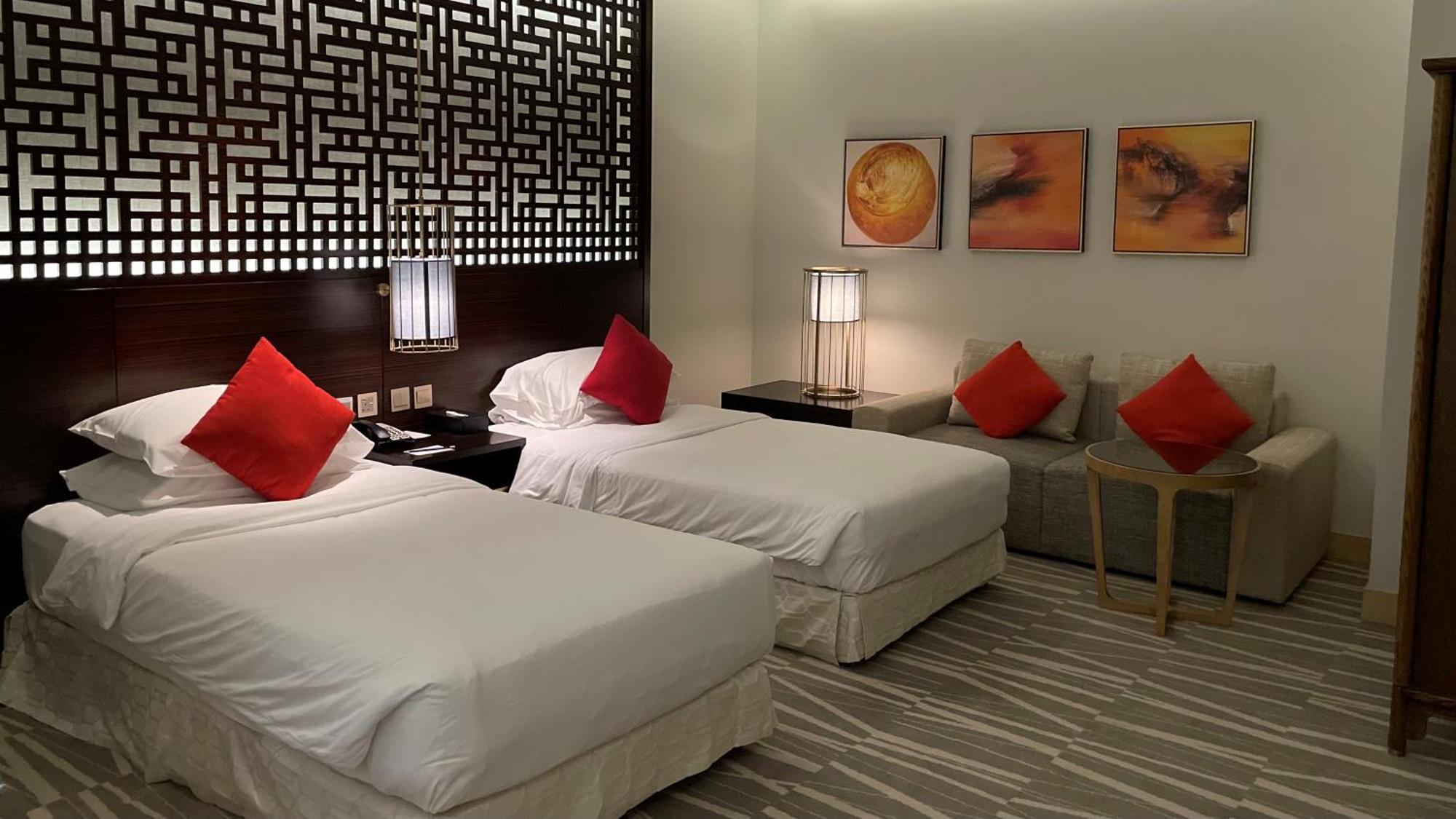 Ramada Hotel & Suites By Wyndham Al Qassim Al Bukayriah Ngoại thất bức ảnh A room at the hotel